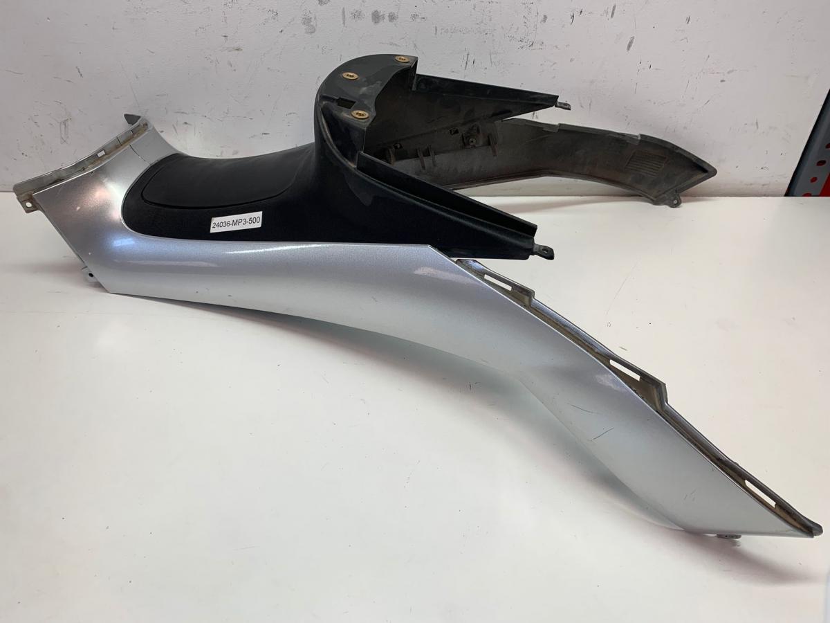 Plastico parte central tapon gasolina MP3 500 2012